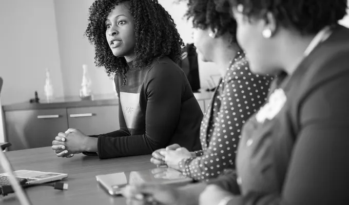 Photo of three women in a meeting. Photo by Christina @wocintechchat at unsplash