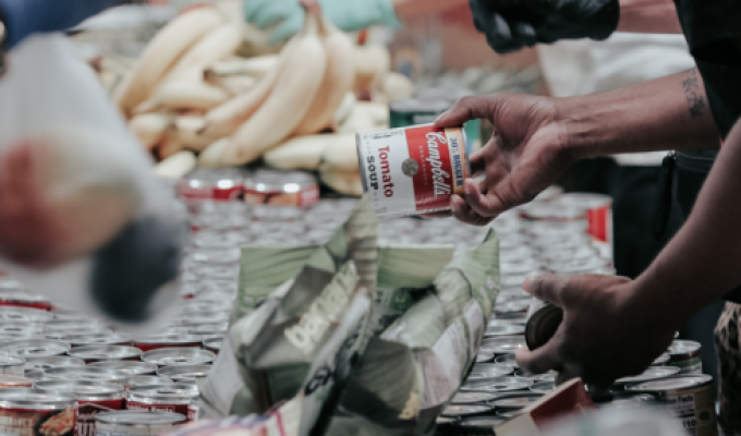 Close-up of hands helping out at a food shelf