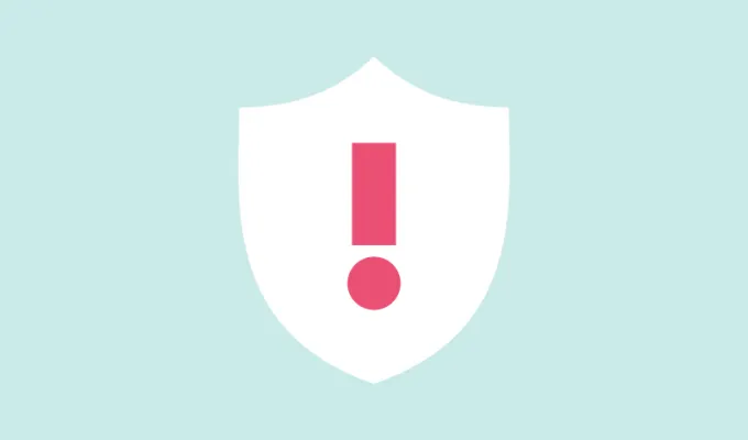 Vector image of a badge with an exclamation point in the middle