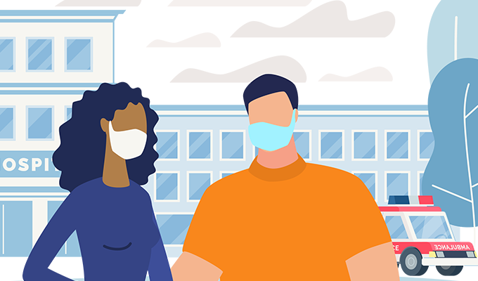 Image of two masked people in front of a hospital
