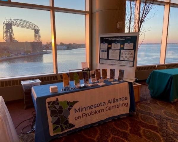 Photo of MNAPG exhibit with the Duluth lift bridge in the background