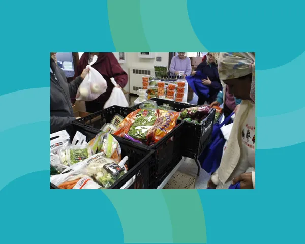 People choosing food at a food shelf